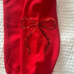 Anthropologie Red Sequin Bow Joggers